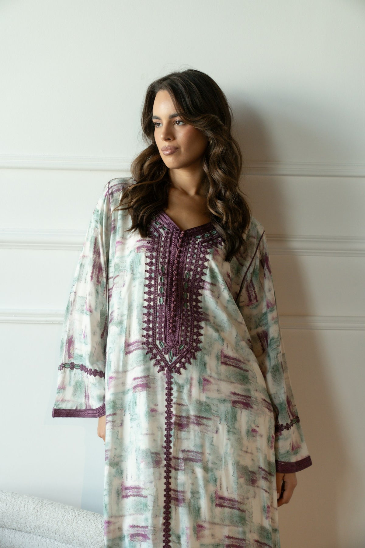 Woman wearing an embroidered dress